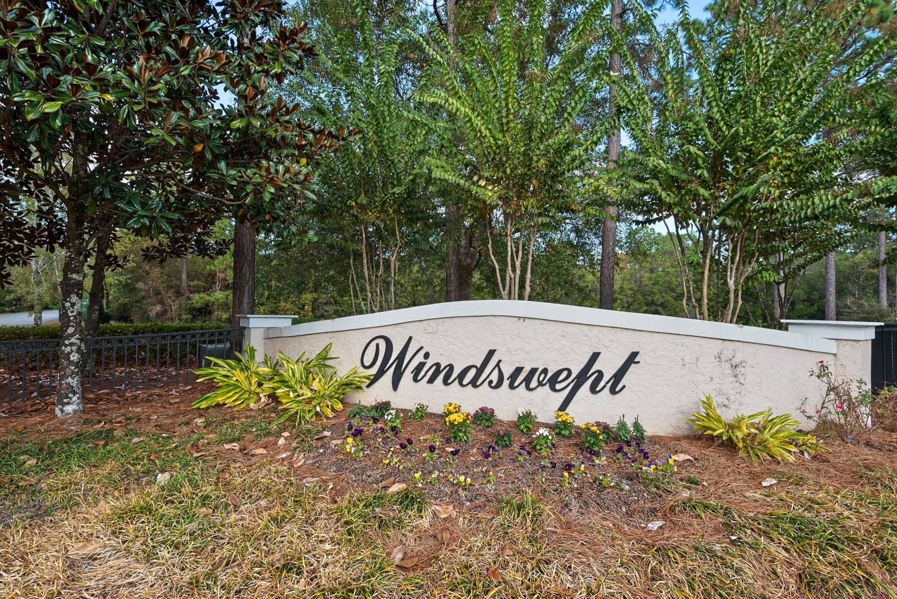 Located in a cul-de-sac and backing up to the Windswept Dunes 4 star rated 18-hole golf course designed by Doug O'Rourke. Lot is a short distance to the pool amenity. Windswept Dunes is located just 30 minutes from Destin and 30 mintutes from Panama City Beach airports. Large home site lot surrounded by nature and privacy. 15 minute drive to the Beaches of S. Walton.