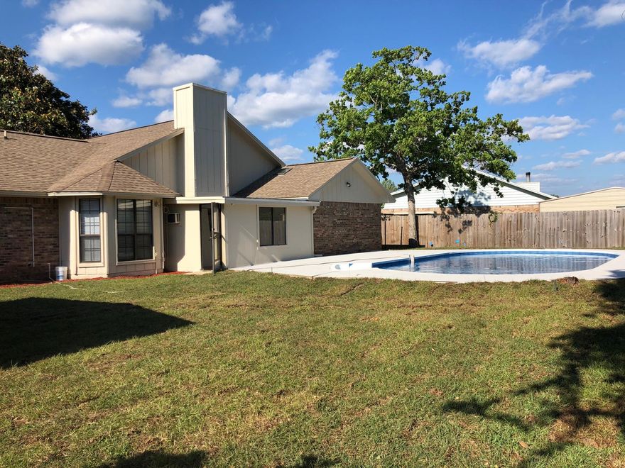 New photos coming soon. Sweltering summers will be made cooler in this recently updated pool-home! Home features a NEW 5 Ton CHA and a newer roof. Inside the home you have a large living room that will be perfect to entertain guests in. Home also features a bonus room that could be used as a office, hobby room, study, or whatever else fits your needs. After a long day, take a leisurely stroll on the sidewalks found throughout the subdivision. Home is located near the main gate to Hurlburt Field, Florosa Elementary School, and the beautiful beaches of Navarre.