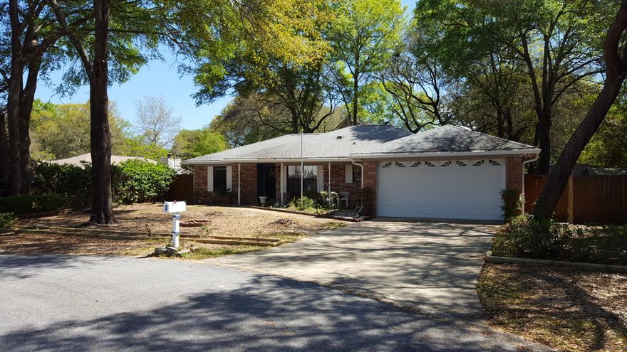 Available for move in May 13, 2016. Great Niceville location! Three bedroom, 2 bath with formal dining located in a cul-de-sac. New carpet tile, new ceiling fans, and upgraded stainless steel appliances. Cathedral beamed ceiling and fireplace in living room. Screened porch with hot tub overlooking the backyard. In the yard, you will find an adorable fish pond, mature trees and a storage shed. There is an additional shed that will be for owner storage only. Washer & Dryer hookup in the two garage. Pet weighing upto 20 lbs may be approved with $400 pet fee. More photos coming soon!