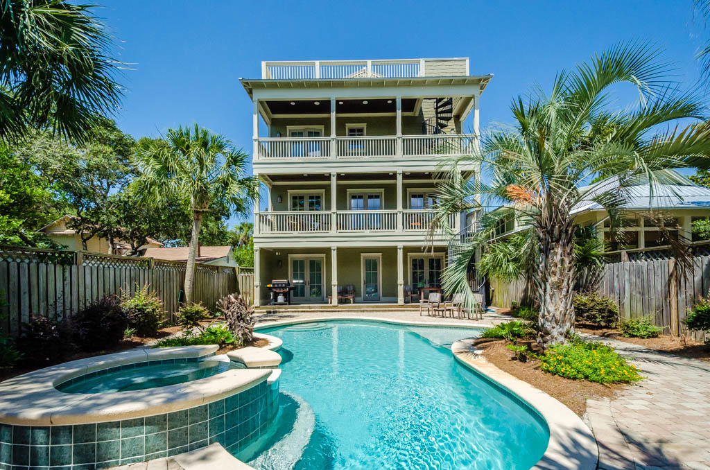 Set in the idyllic village of Grayton Beach; this luxury house offers 6 bedrooms, 4.5 bathrooms, and a private lagoon pool! The open floor plan of this beautiful beach house allows for easy entertaining with a large kitchen and an eating/serving island that flows into the living room and the formal dining area. From the granite countertops and gourmet stainless steel appliances to media/activity room with a foosball table make this an exceptional beach getaway!The first floor includes the game room and large flat screen TV. Two bedrooms (1 King Bed and 1 Queen Bed) on each side of the floor have direct access to the back porch and pool.The second floor has the kitchen, dining room, and family room which open to a large sunny sheltered deck overlooking the pool. One bedroom with 2 bunk