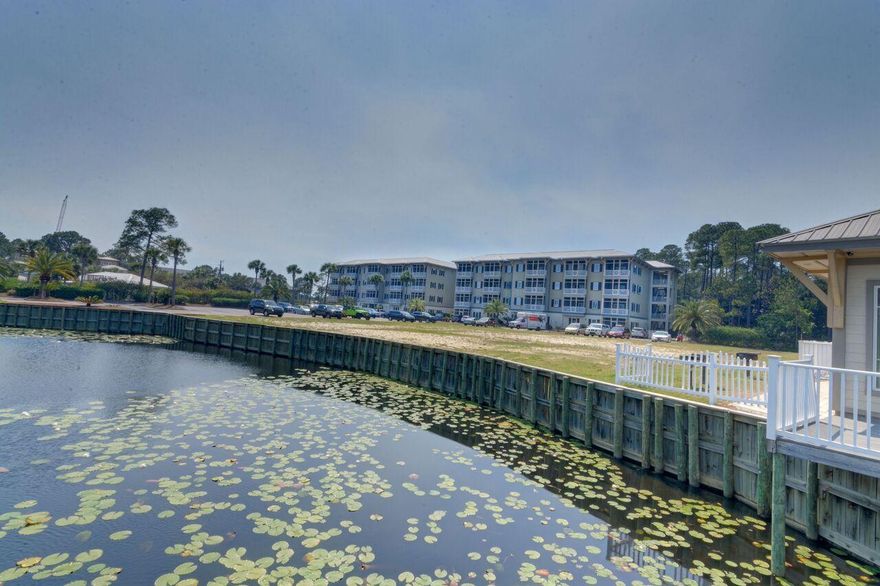 Move-in ready! This 1st floor, furnished condo is in great condition. It is located within walking distance to the beach in the heart of Seagrove. It's a bike ride from Seaside and close to all the wonderful shops, restaurants, entertainment and bike trails that makes Hwy 30A so desirable. The kitchen features maple cabinets, all appliances including a solid surface stove, pantry and an island. The living room has 9 foot ceilings with crown molding plenty of natural lighting and French doors opening onto a lovely screen porch. The Master Bedroom has a double sink, tub and separate shower plus three closets! Additionally, there is a laundry area with new washer and dryer, two guest bedrooms, guest bath and exterior storage closet This four story gated development offers a large pool, grilling area, community room, and an expansive deck overlooking Lake Mira...perfect for fishing. This condo is currently on a short term rental program.