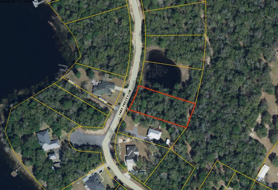 Beautiful building lot in exclusive subdivision! Wooded 1/2 acre lot on paved street, lot has gentle slope that might be suitable for a split level home plan. Exclusive subdivision with restrictions, no mobile homes allowed.