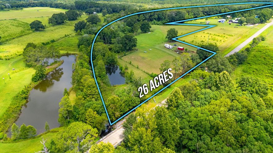 This stunning 26-acre property offers endless possibilities for farming, hunting, or building your dream home. The generous lot features 3 charming ponds, established pastureland, and a mix of longleaf pine and hardwood timber that creates a park-like atmosphere on the north side. Practical amenities include a 10x20 shed, cow pen with shoot, quality fencing with gates, plus power and public water already connected, close to Lake Jackson, and a short drive to the World's Most Beautiful Beaches. Wildlife enthusiasts will appreciate the abundant hunting and fishing opportunities, while the paved road frontage ensures easy access. Whether you're planning to farm, build, or simply enjoy nature's bounty, this well priced gem delivers exceptional value and versatility in beautiful Florala.