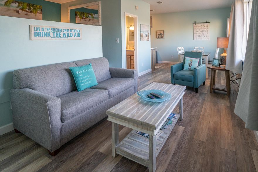 BACK ON MARKET!  This adorable ISLAND CONDO went under contract at the first showing. It's now available due to No Fault of the Seller!This Beautifully remodeled condo is just a short walk to the Beach! The view of the sound,stainless steel appliances and quartz countertops are sure to please, not to mention it comes fully furnished! *Short Term Rentals Allowed*