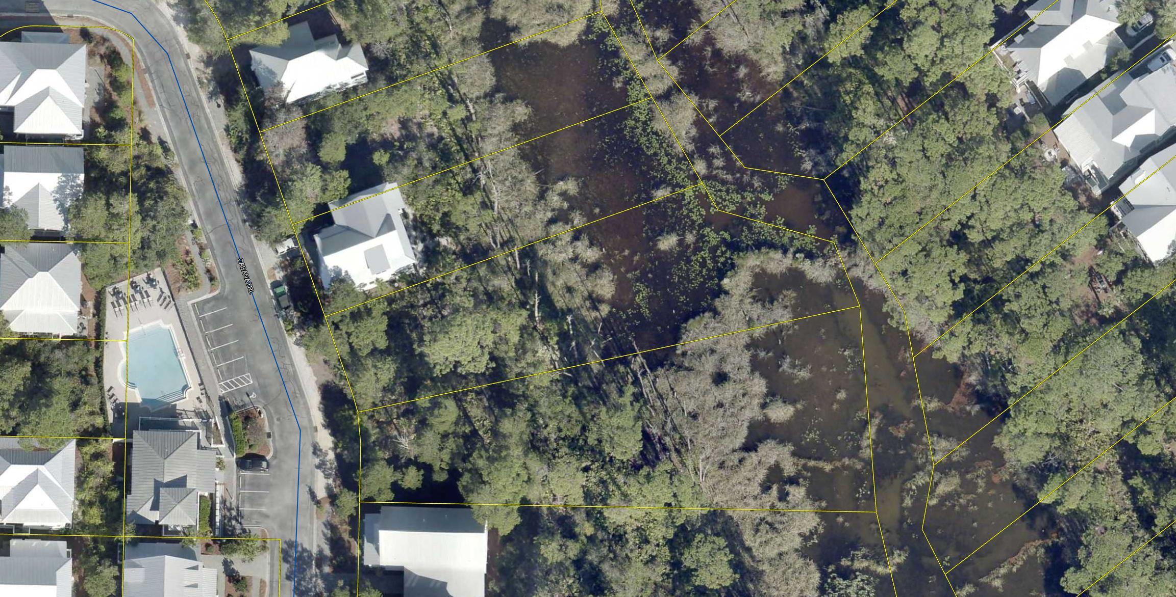 This wonderful lot in Lakeside will offer the best in peaceful ambience from its back porch. The views across the lake and woods are unparalleled. This location, directly across from the pool, would make your home an excellent investment location for a rental or just a wonderful location for a permanent home. The location also provides one of the closest lot locations to get to the Beach. Lakeside is in the middle of Blue Moutain Beach and there are several restaurants and an ice creamery within walking distance. Located just off HWY 83, you have direct access to HWY 98, missing the 30a traffic. Immediately behind Lakeside is Washington State Park, offering biking and walking trails through miles of State Forests. You can visit Seaside and Grayton nearby. 17 miles of biking paths beckon.