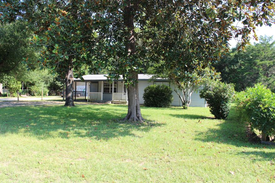 Excellent starter home or great investment property. Home has a nice front porch with attached covered carport. Owner has recently replaced the gas water heater and AC unit within the last year. This home has a very open floor plan with large bedrooms. Property has a shed out back great for additional storage or workshop.