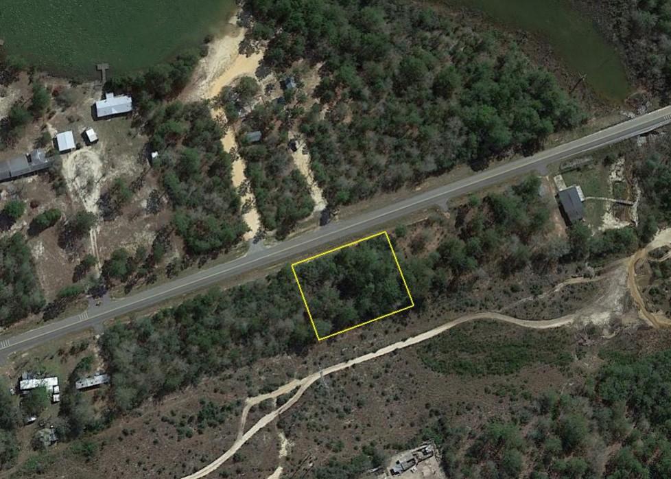 Nice 1/2 acre wooded lot on a paved road. This lot consist of two 1/4 acre lots. Build on both or as one.