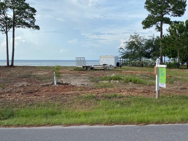 Beautiful 100 foot lot on the bay. Lot is cleared and ready to build. Very nice seawall in place.