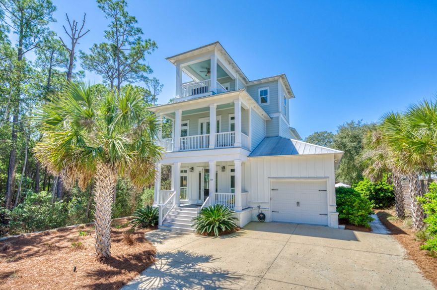 Nestled on the sought-after east end of 30A, 349 Seacrest Drive is a stunning beach home that offers the perfect fusion of laid-back coastal charm and high-end luxury. Boasting over 2,900 square feet of thoughtfully designed living space and set on a rare half-acre lot, this property is a true gem in one of 30A's most desirable neighborhoods.From the moment you arrive, the home invites you in with its warm architectural style, rich hardwood floors, and coastal-inspired finishes. Shiplap walls, natural light, and open-concept living spaces create an airy, welcoming vibe that feels both elevated and effortlessly relaxed.The heart of the home is the oversized chef's kitchen complete with stainless steel appliances, a gas range, large center island with seating for five, and an adjacent wet bar outfitted with an ice maker, mini fridge, and prep sink. Whether you're hosting a dinner party or preparing snacks after a beach day, this kitchen is made for gathering.Flowing seamlessly from the kitchen and dining area is the expansive living room and backyard retreat. Step outside to find your own private oasis: a resort-style heated pool, outdoor dining area, gas fire pit, gas grill, and Big Green Egg all surrounded by lush landscaping and plenty of space to lounge or entertain. With a backyard like this, every day feels like a vacation!The first-floor Primary Suite is a sanctuary unto itself. The ensuite bathroom is spa-worthy, featuring a soaking tub, custom-tiled walk-in shower, double vanities, and a large walk-in closet.Upstairs, you'll find three beautifully appointed guest bedrooms each with its own private ensuite bathroom, offering comfort and privacy for family or guests. The third floor is home to a stylish loft featuring custom-built queen-over-queen bunk beds, a private balcony, and a full bath, making it the perfect hangout space for kids or a fun bonus room for larger groups.This location is as ideal as the home itself. Just a short stroll or bike ride to the sugar-white sands of the Gulf, and perfectly positioned between Alys Beach and Rosemary to the east, and Seagrove and Seaside to the west, you're never far from world-class dining, boutique shopping, and endless entertainment. Plus, The Big Chill (formerly The Hub) is just a short golf cart ride away, offering live music, movies on the lawn, family-friendly events, and great food in a vibrant, social setting.Whether you're looking for a forever home, a second home, or a high-performing vacation rental, 349 Seacrest Drive offers the ultimate 30A lifestyle- private, luxurious, and full of coastal charm.