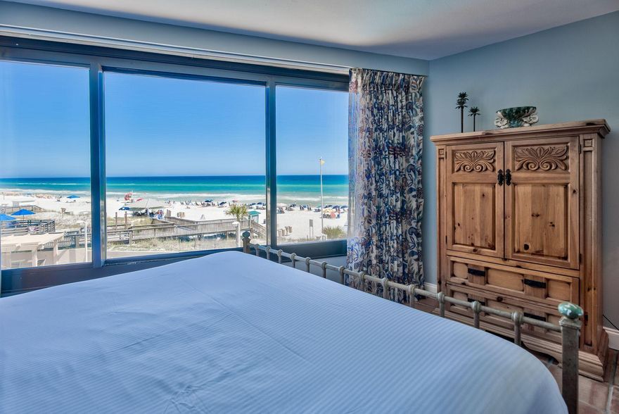 When you awaken in this charming gulf-front condo, you can observe beach activity and behold emerald green waters to the horizon before your feet hit the floor. The view is mesmerizing from the gulf front bedroom and the floor-to-ceiling glass sliders in the living room. The third-floor location is perfect for a bird's eye view and convenient enough to be on the beach or poolside in minutes. The condo is an eclectic blend of class and Spanish heritage with plenty of beach appeal. The dining nook next to the kitchen makes serving a breeze. The living room is filled with natural daylight streaming in and amazing unobstructed views of the unceasing flow of the Gulf of Mexico lapping the shore line. Terra cotta floor and shower tiles lend a rustic flair.