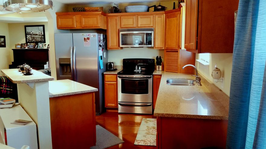 Home Sweet Home! Charming home with 3 bedroom 2 bath office and bonus room! Located in the center of Crestview just south of HWY 90, this home is immaculately clean and has been lovingly well maintained. This cozy home has a living room with tray ceilings along with stained concrete flooring and beautiful fixtures throughout the entire home. With stainless steel appliances, the kitchen has corian countertops, an island, hanging pot rack and large cabinets.The master bedroom is a catch with its nice size walk-in closet and custom bath. The master bath is a must see! It has a large custom shower with multiple shower heads along with a built in bench and double vanity with unique stainless bowl sinks. There is recessed lighting throughout home with dimmers in living room and master.