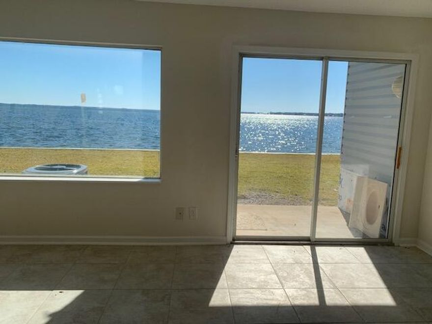 Waterfront condo in a gated complex that is ready for someone to make it their own. Seller is in the process of installing new lower kitchen cabinets/countertops. Secured laundry room and a pool on site.