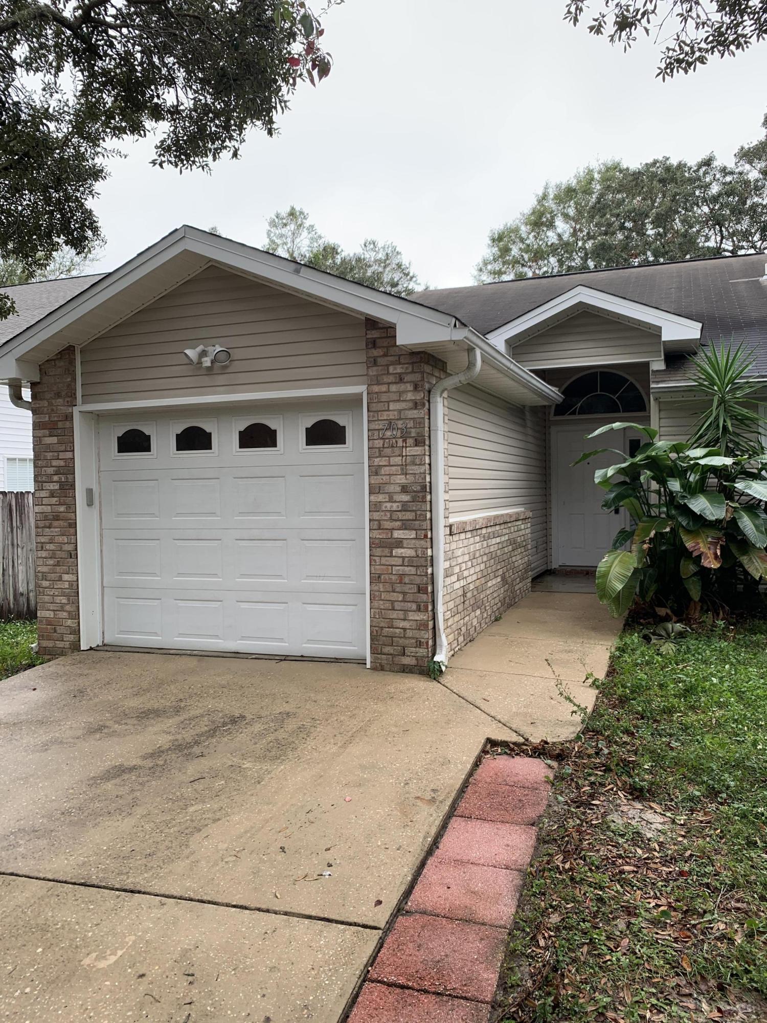 One Story end unit townhome with garage and fenced yard. Appliances include Refrigerator, Washer, Dryer, Stove, Dishwasher, Disposal and Microwave. The Kitchen has a Breakfast Bar and looks out to the backyard as does the Living room. Close to beach, shopping and bases. Ceiling fans throughout. Home has a sprinkler system and lawn pump. No smoking or pets.