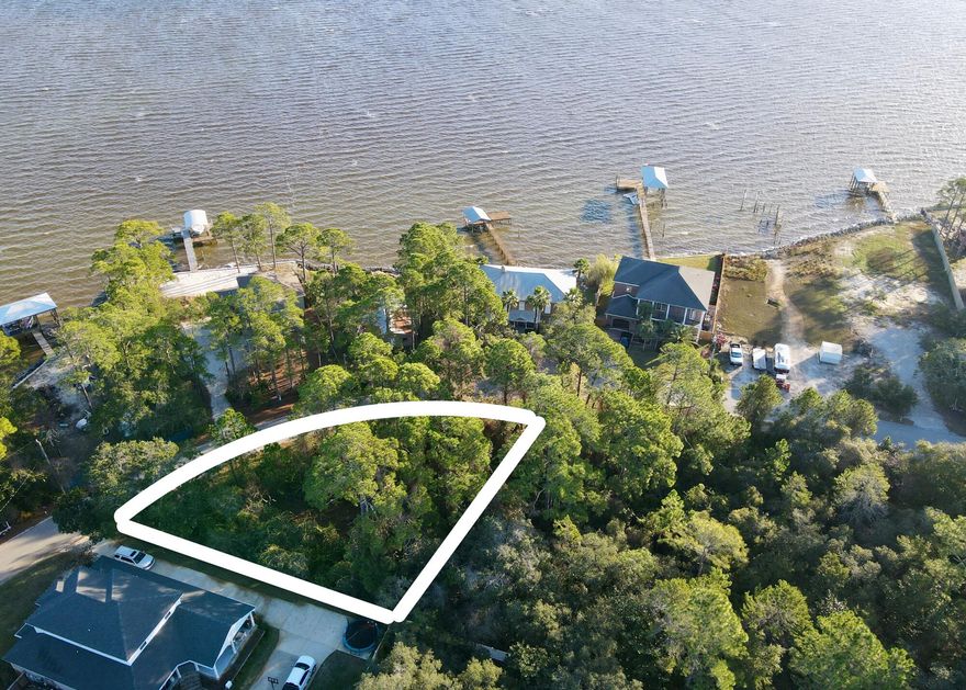 Discover an exceptional opportunity to build your dream home on this unique lot, comprising approximately 0.3 acres of pristine land in a fantastic location off Buck Bayou. Positioned strategically, this property holds the possibility of bay views from a multi-story residence, providing an unparalleled setting for a coastal lifestyle. Nestled in close proximity to the Choctawhatchee Bay, Sacred Heart Hospital, Grand Boulevard, and Sandestin, this location seamlessly blends tranquility with convenience. Some initial work has already been completed by seller including survey, elevation certificate, geotechnical and stormwater engineering. Envision the limitless possibilities this parcel offers for creating your own coastal haven.