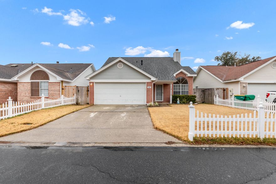 Come check out this well-maintained single-family home, located less than 8 miles from both Eglin AFB and Hurlburt Field, and close to hospitals, dining, shopping, local schools, and Northwest Florida State College. Enjoy great curb appeal with brick veneer, a partially fenced front yard, and a fully fenced backyard. Inside features tall ceilings, a bright living room with fireplace, and plenty of natural light. The primary suite is downstairs with a walk-in closet and private bath, plus a convenient half bath on the main floor. Upstairs offers 3 additional bedrooms and a full bath. Remodeled kitchen with solid-surface countertops and a dedicated dining area. 2-car garage.