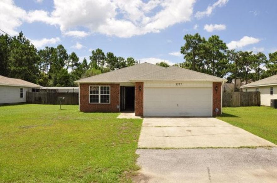 REO. If your must-have list for a home includes a spacious backyard, convenient location, and fantastic floor plan, then this home could be the one for you! Upon entering the home, you will notice the vaulted ceiling in the living room which makes the room feel even more spacious. In the kitchen you will find a breakfast bar and a convenient dining area right off of the kitchen. The master bedroom offers lots of space and the ensuite comes complete with a double vanity and a garden tub to soak in after a long day. Entertain guests in the screened porch and enjoy the spacious, fully privacy fenced backyard. Conveniently located just minutes from schools and the beautiful Navarre beaches!