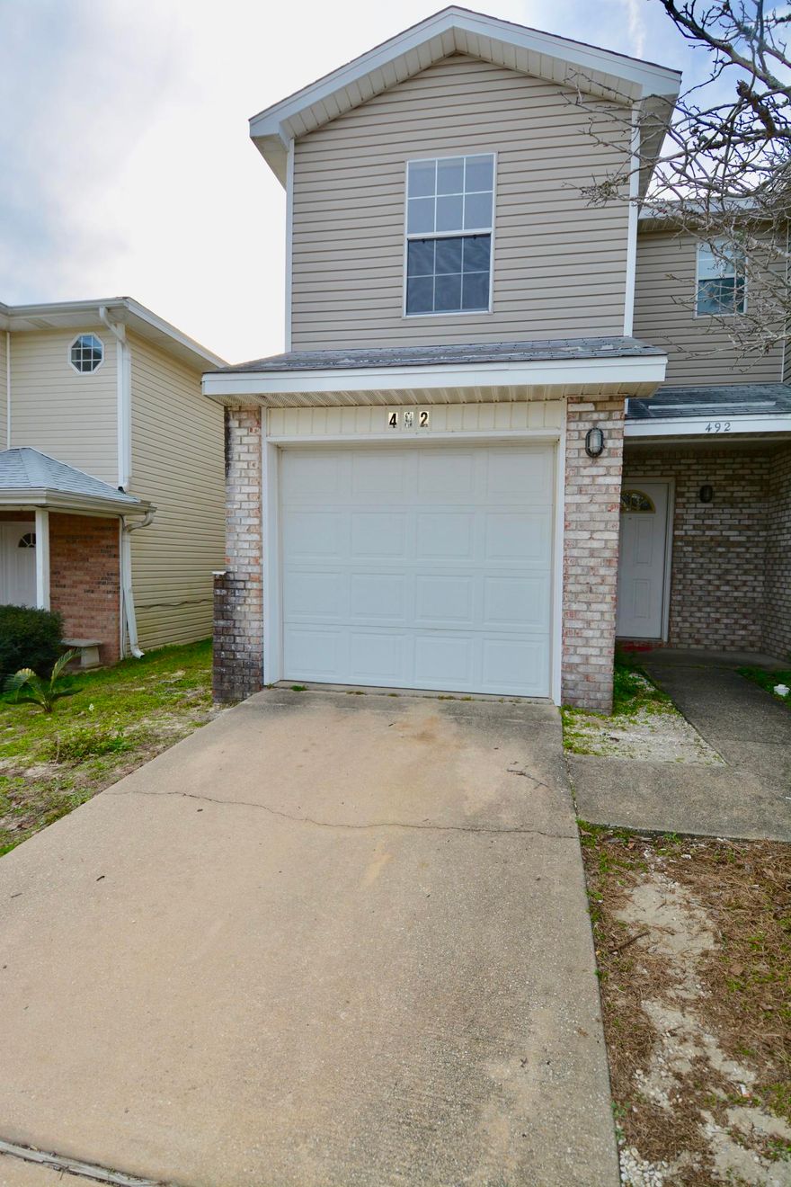 Back to the market and better than ever with a NEW ROOF!! Perfectly located townhome less than a mile from the main gate of Hurlburt Field AFB. Great for a permanent residence or rental investment with rental projections of up to $1,100 / month. This spacious townhome features, laminate flooring throughout private bathroom off each bedroom; half bathroom off the living room and plenty of storage. With an open floor plan leading from the living/dining room to your fenced in patio it's perfect for entertaining or family get togethers. Within close proximity to shops, the beach and base this is a fantastic property to call your own.