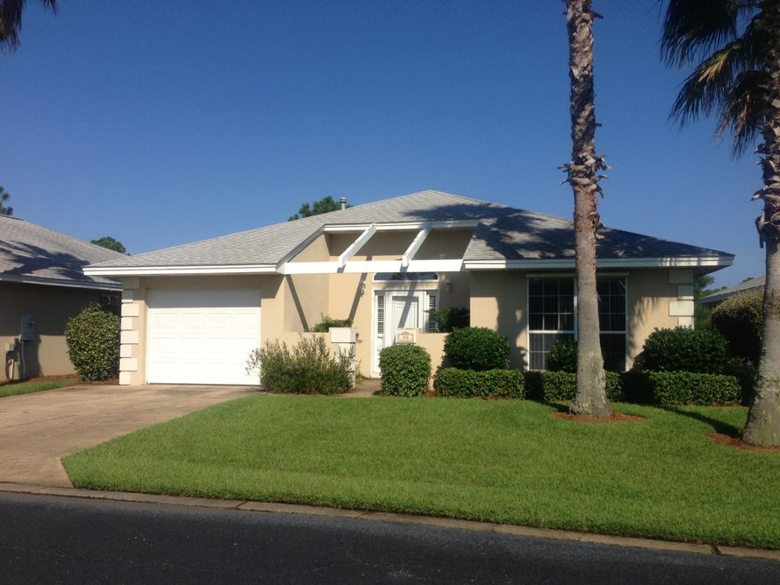 Easy living in this one story open floorpan home in the Bayside neighborhood. Home offers a living room with fireplace, sunroom, patio and wood/ tile flooring throughout. This side of the street has water views from the rear of the home.Bayside is a wonderful family neighborhood within walking distance to the Silver Sands Outlet Mall. Recreational activities include a large pool, pavilion area, tennis court, shuffleboard, kids playground, gated bay front pier and more.