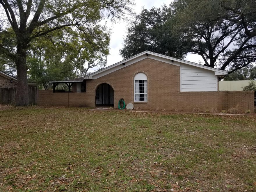 Large lot with beautiful, protected and registered Oaks. Within walking distance to park. HVAC replaced in 2016. No refrigerator, dishwasher or sprinkler system. House is plumbed for gas but currently not using it. Home needs work and is being sold AS IS. Owner has a survey.