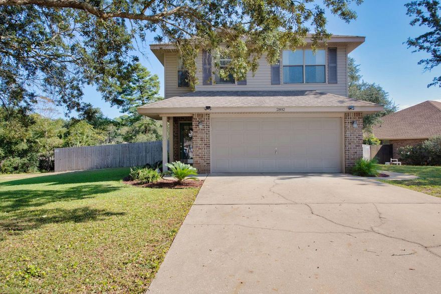 This impeccably maintained 4 bed, 2.5 bath home in the desirable Waterstone subdivision of Navarre is now even more enticing.  Walk inside to an inviting entry hall that opens to a bright and airy living/dining area. Natural light pours in through four large windows, highlighting the luxury vinyl plank flooring throughout the lower level. The kitchen features stainless steel appliances, a large pantry and beautiful cabinetry. The first floor also includes a half bath and a 2-car garage. Upstairs, you'll find the master bedroom as well as three generously sized bedrooms, two full baths, and a laundry room for added convenience. Enjoy the outdoors in your expansive, fenced backyard, complete with well irrigation for easy maintenance. With just a 15-minute drive to Navarre Beach and easy access to Pensacola and local military bases, this home offers the perfect blend of tranquility and convenience. Don't miss this opportunity!