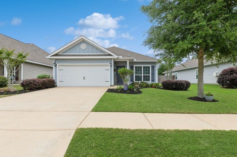 Don't miss out on the opportunity to own this meticulously maintained home! With 3 bedrooms, 2 bathrooms and a flex space/bonus room along with its unique location on Central Park in Hammock Bay, this is a rare opportunity you won't want to pass up.  This property features an open floor plan that is perfect for entertaining!  The living room opens to a screened porch area and spacious yard with additional paver patio and backs up to the amenities of Central Park.  The home is centrally located in Hammock Bay so that you are within half a mile to pools, clubhouse, General Store, eating and entertainment; with the new brewery opening soon!  The home features granite countertops, hardwood flooring throughout the main living areas, updated lighting, ceiling fans, a floored attic that is