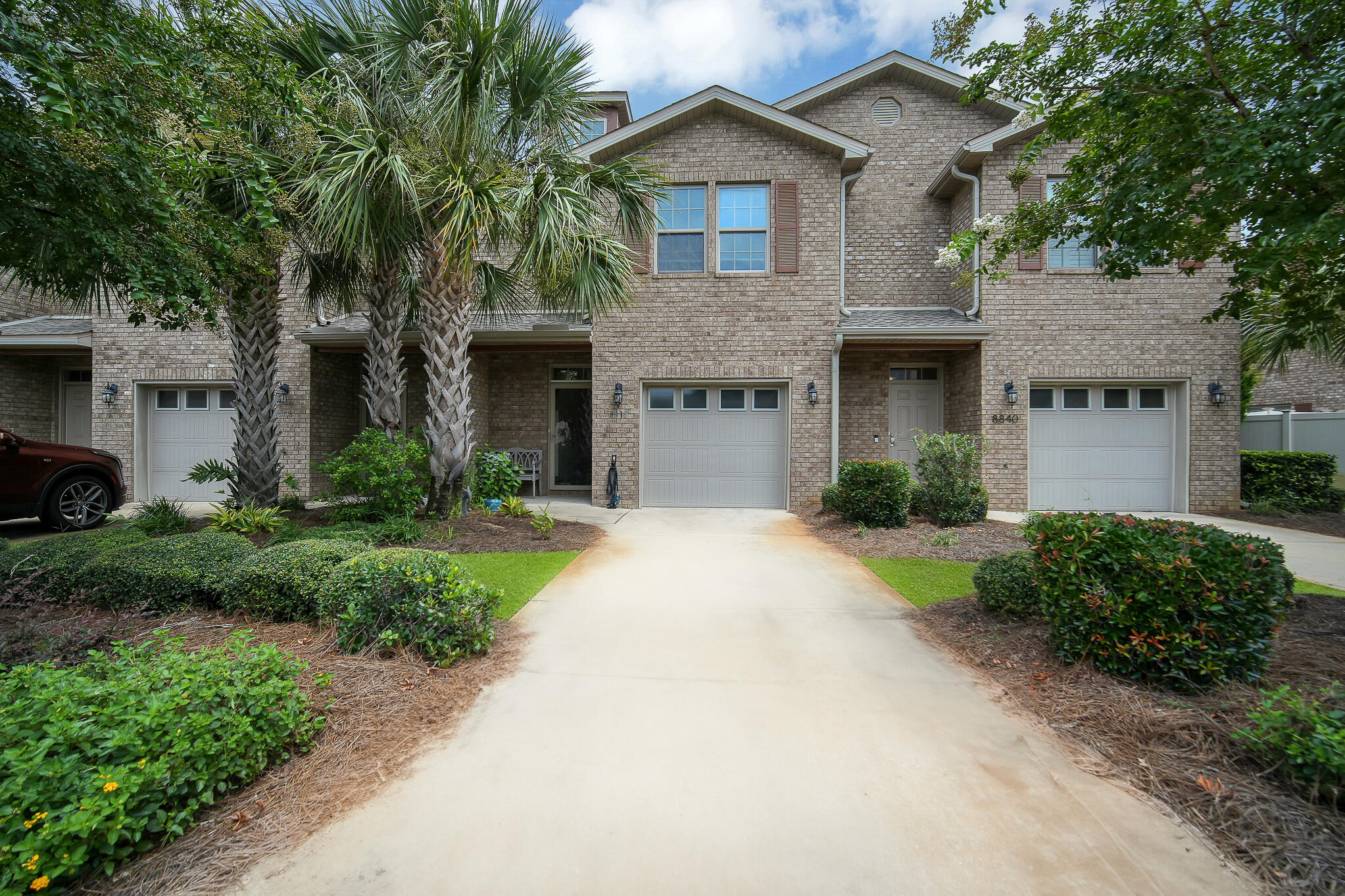 Most Furnishings Convey! Discover coastal living at its finest in this meticulously maintained townhome, perfectly situated just 2.5 miles from the stunning Navarre beaches. Located within the desirable Reserve Pointe community, this home combines comfort and convenience with a touch of luxury. Step inside to find a spacious 3-bedroom, 2-bathroom residence offering 1,536 square feet of thoughtfully designed living space. The open floor plan offers recessed lighting and a seamless flow from room to room. Enjoy the durability and style of the vinyl flooring throughout the main areas, with plush carpet in the upstairs. The heart of the home is the chef's kitchen, featuring sleek granite countertops, high-quality stainless steel appliances, and a well-sized pantry.