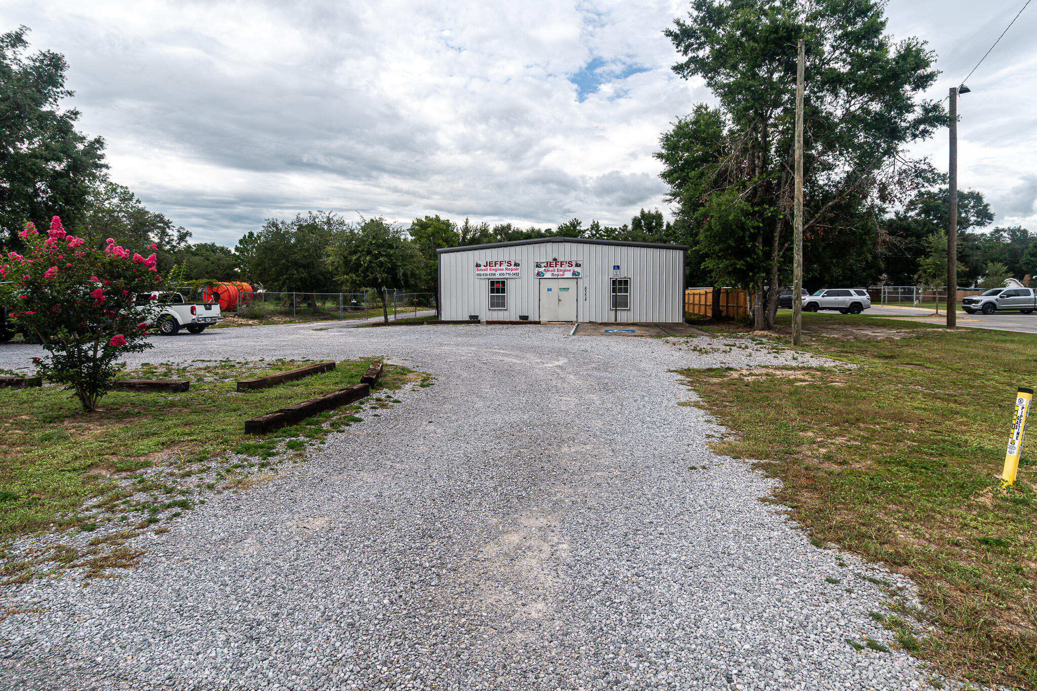 This property is zoned HCD. The 3,200 square foot metal building was added in 2016 of which 856 sf is office space with 2 restrooms and the remaining 2.344 sf is an open workshop. Current usage is a small engine repair shop. The active business operation is not included in the sale. Building/Land only.
