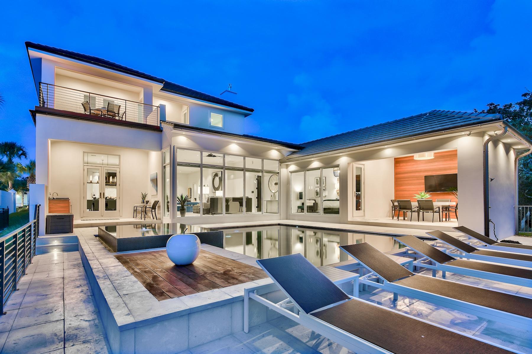 Modern elegance meets artful coastal contemporary design in this awe-inspiring beachside lake front residence newly completed in 2018 and ideally located two tiers off the Gulf of Mexico in the gated community of Destiny. This pristine contemporary retreat has been professionally designed, furnished and curated by Coastline Luxury Homes and has been masterfully configured featuring 5 bedrooms (including a pinterest-worthy oversized bunk room), 5 full ensuite bathrooms (3 of 5 bathrooms have double sinks) and a large open floor plan with clean lines and pristine lake vistas. This property is the perfect arrangement for a primary, secondary or rental focused end-use, economically designed for low maintenance living.