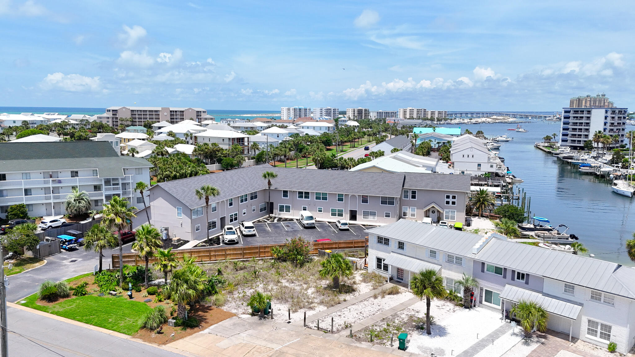Offered at 146K Under Recent Feb. 2025 Appraisal for a prompt sale! Fully Renovated true 3BR Townhome in Destin - Beach, Boats & Backyard Bliss! Welcome to your slice of paradise on Holiday Isle! Step inside to discover a thoughtfully reimagined interior completely renovated from top to bottom--because who really wants a ''project'' when the beach is calling? Featuring modern finishes, stylish fixtures, and an open layout that invites effortless everyday living and entertaining. Every detail has been addressed- from the flooring and paint to the kitchen and baths - Simply move in and start enjoying the beach life you've been dreaming of. Outside unwind in your private, fenced-in backyard, ideal for grilling, chilling, or reading in a hammock. This outdoor area extends your living space and offers a true sense of retreat. Location is everything and this home delivers! Enjoy 2 private deeded beach access just a short stroll away & take full advantage of the on-site private dock and shared boat slips perfect for sunset cruises or spontaneous fishing trips, easy access to the Pass, the Gulf, & Crab Island. No boat? No problem. Just call the water taxi to your dock and cruise straight to the best bars, restaurants, & waterfront attractions on the Destin Harbor. Turnkey, low-maintenance, and loaded with lifestyle perks, this property captures the essence of easy coastal living. Don't miss your chance to own a Beautifully updated townhome in one of Destin's most desirable waterfront communities! Whether you're looking for a trendy beach getaway, a rental investment, or your forever coastal home, this townhome brings the best of Destin right to your doorstep. Schedule your private showing today!