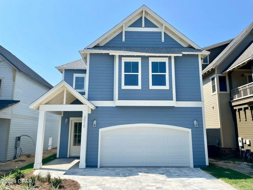 Introducing a brand-new home in the prestigious gated community of Sanctuary Beach! This stunning 4-bedroom, 3-bath residence offers an open-concept layout that blends indoor and outdoor living. Enjoy Quartz countertops, soft-close cabinets, and a spacious master suite with double vanities, a custom floor-to-ceiling tiled shower, and a walk-in closet that connects to the laundry room. Modern features include stainless steel appliances, a pot filler above the range, a 7-foot kitchen island, and a Butler's pantry. Luxury vinyl plank flooring, 10-foot ceilings, and elegant finishes elevate the space. Additional highlights include a 2-car garage with a brick paver driveway, mudroom, irrigation system, and a covered back patio with ceiling fan.