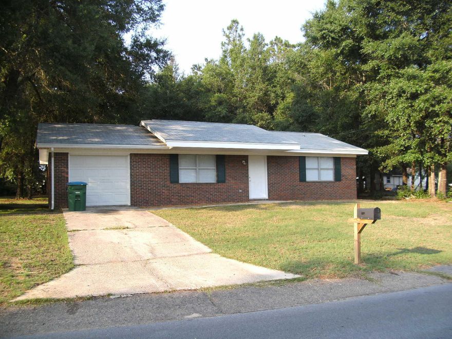 Back on the Market! Great brick starter or investment house. Convenient to Schools and Services. Quiet location. Newly painted and carpeted. This place won't last long. Buyer or Buyer Agent should check all measurements for accuracy.