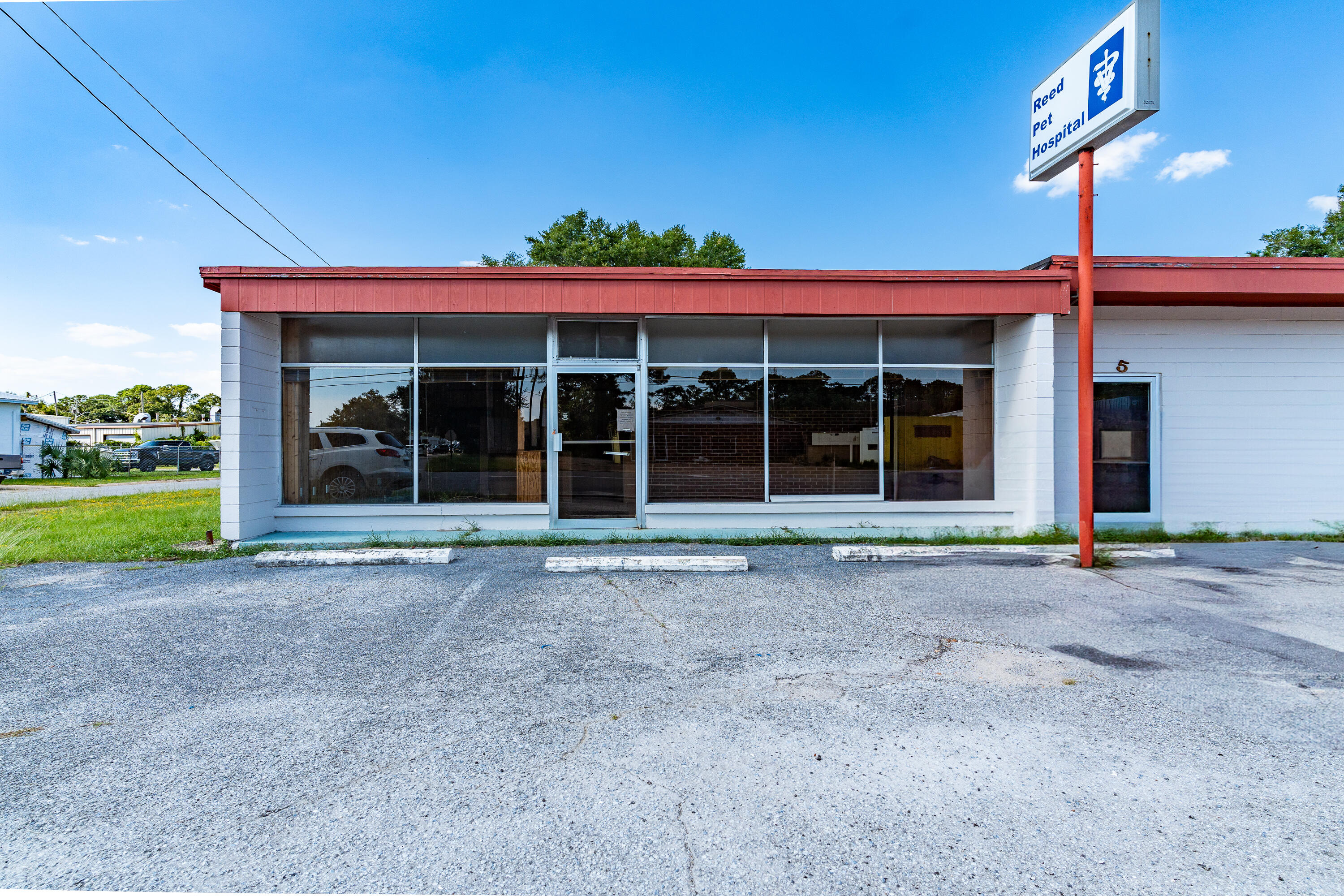 Excellent opportunity for commercial space within the heart of Fort Walton Beach. With over 3100 square feet under roof, the property allows for a multitude of options. Previously set up as a Pet Hospital but can easily be remodeled for Retail space, Office Space, Pool Company, Pest Control, etc. This parcel is within the city limits and does lie within the area eligible for the CRA grant and incentives Program. Ingress and Egress, off of Walter Martin Road and Shell Ave. The building does have two entrances off of Walter Martin, which could allow the space to be divided. Unit is also available for lease. $3750/month, triple net.