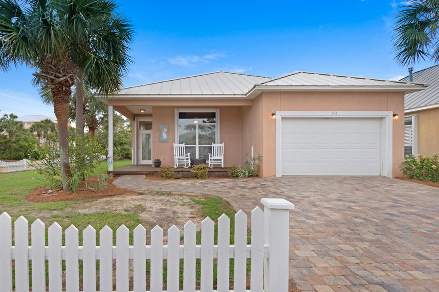 Emerald Coast charm meets modern comfort in this stunning beach house! Located just approx 600 yards to the private gated beach!  open-concept layout, and plenty of natural light. kitchen boasts updated appliances and a breakfast bar, perfect for entertaining. Primary Bedroom with large primary bathroom with shower, separate bathtub/shower & walk in closet! Relax on the back deck or the covered deck to watch the sun go down! Whether you're looking for a serene retreat or a lucrative vacation rental, this property is a rare find. Don't miss the chance to own your slice of paradise.