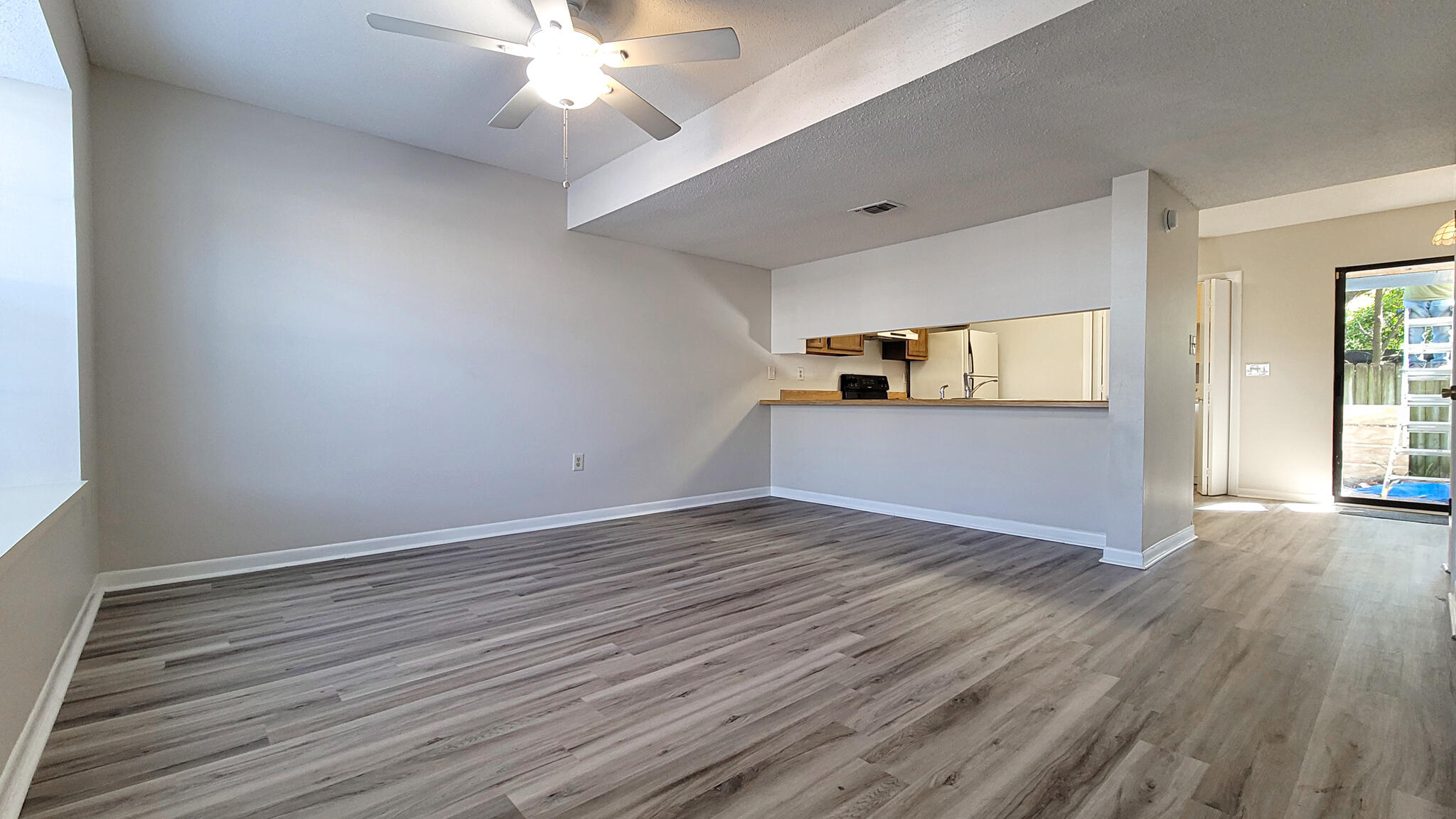 Why rent when you can own? Great location tucked away in a nice neighborhood with amenities in the area. Spacious living area with a bay window, freshly painted and new laminate flooring throughout the downstairs. Large kitchen with lots of counterspace and plenty of cabinets to include a pantry. Inside laundry room. Dining area has a sliding glass doors that lead out to a covered patio with a fenced in yard perfect for grilling out this summer. Half bath conveniently located on the first floor. Upstairs has two large bedrooms with plenty of closet space. Privacy fenced yard for a . Ideal location within 5 minutes of schools, parks, boat ramp, downtown Fort Walton Beach, shopping, dining, and both Hurlburt Field and Eglin AFB. Call us today for a showing
