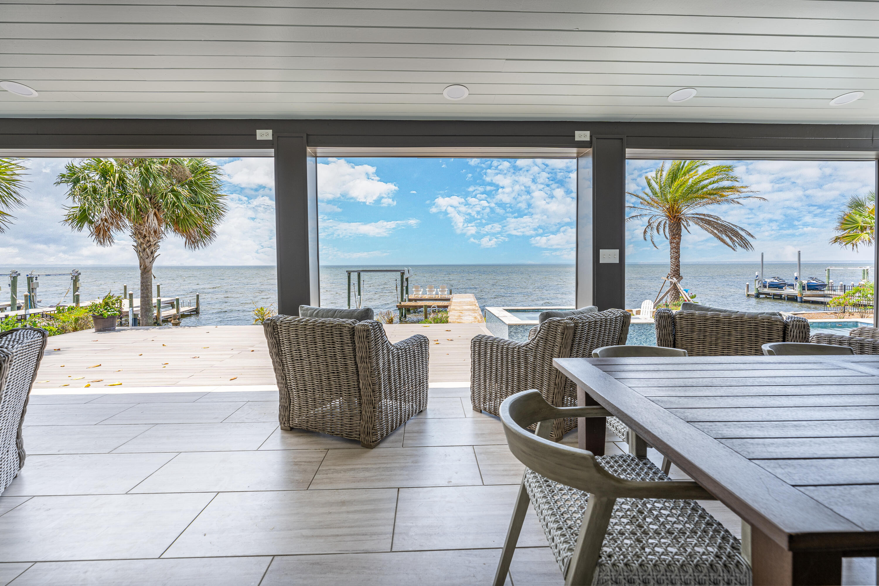 Bay Front Estate in Burnt Pine Behind the Private Gates of Sandestin Golf & Beach Resort. Home Sits on a 104 Ft. Wide Lot near the End of a Cul De Sac on Bay Estates Circle. Home has Undergone Massive Renovations Inside and Out with Hardwood Floors throughout the First Floor of the House.New Custom Pool, Spa, Summer Kitchen, Porch and Fire Pit were also Recently Added. Private Main Floor Bedroom with His & Her Closets, New Bathroom, Fireplace and a 2nd Bedroom Suite are located on the First Floor. Renovated Spacious Kitchen with Quartz Counters and Top of the Line Appliances Opens to the Sun Room and Expansive Living Room. 2nd Floor has a Theater Room for 12 to Watch All the Games and Movies, Along with 5 Guest Bedrooms Each with Their Own Bath.