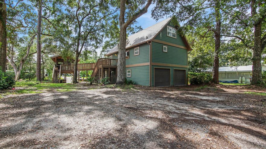 This canal front home delivers the relaxation and peace you have been looking for. Located just across 331 bridge in Freeport right on the canal with
direct bay access. This home has its own private dock and private boat launch! Newly renovated. Newly painted interior, recently added bonus room, new quartzite countertops throughout and more. Two large balcony's offer stunning and tranquil views of the canal lined with Spanish Moss. A bridge connects the main house to the outdoor pavilion. The pavilion is equip with its own tiki bar, outdoor kitchen, tiki lights and chandelier. Awesome for entertaining right on the water. This property would make a great primary residence, second home, fish camp, or a great AirBnB. Possible rental projections 39k - 56k. Depending on use.