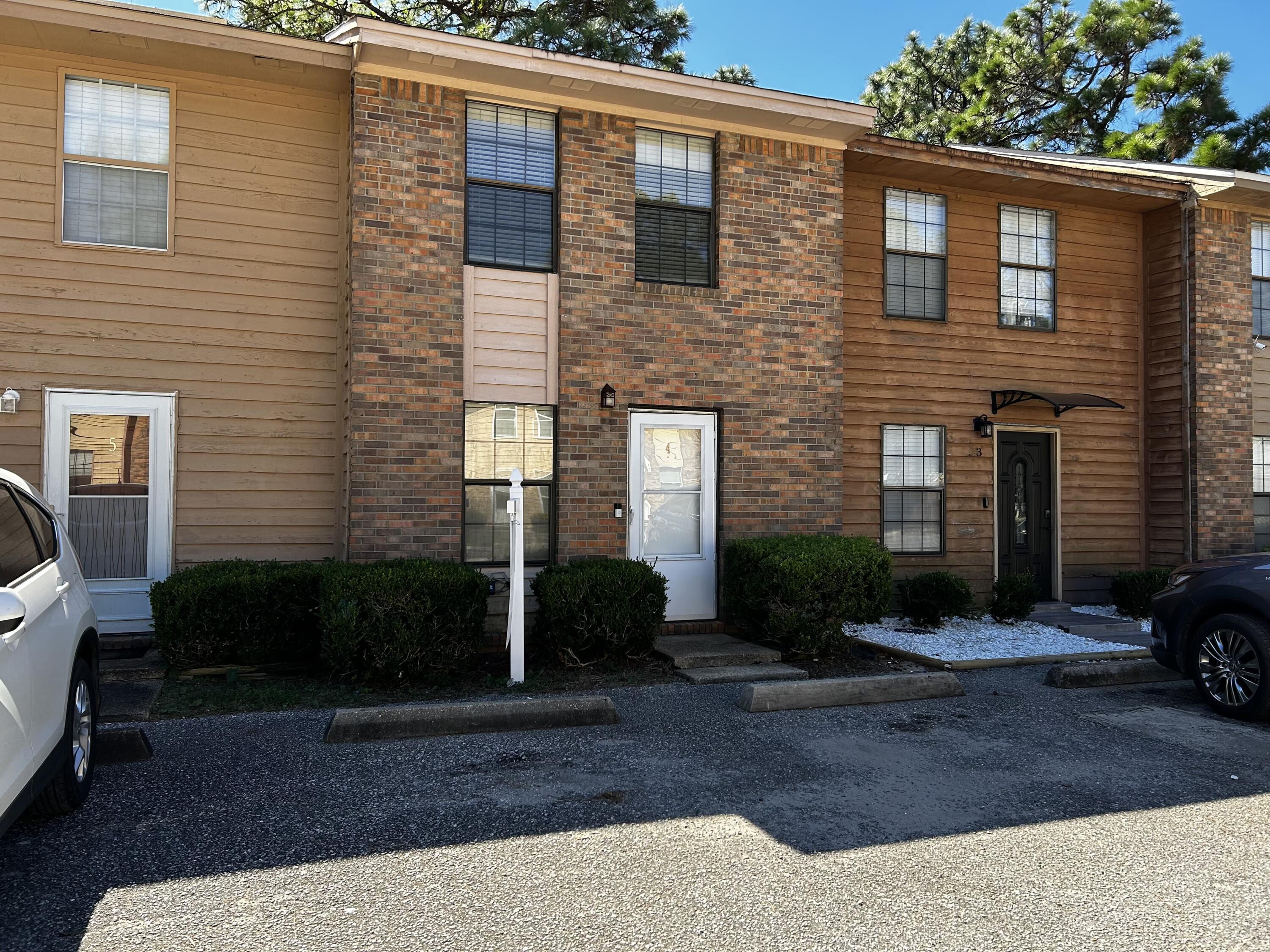 Seller to pay $5,000 in of buyers closing costs. Adorable 2-bedroom  townhome, centrally located in Fort Walton Beach close to Eglin AFB and Hurlburt Field. FRESHLY PAINTED throughout. SHAKER STYLE white cabinets in the kitchen.  A spacious laundry room provides additional storage. See this fabulous townhome today.