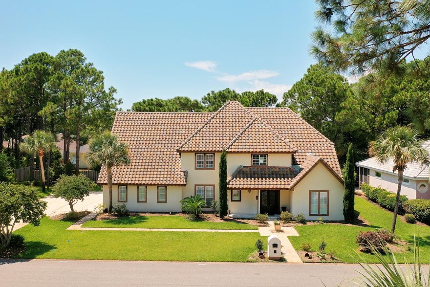 Step inside to a grand entry and nearly 3900 square feet of living space! This 4 bedroom, 3.5 bathroom home with bonus room is located in the gated golf course community of Emerald Bay. Designed for both entertaining and embracing the Destin beach lifestyle, this residence is a blank canvas to personalize! The heart of the home is the gourmet kitchen featuring granite countertops, stainless steel appliances, a small island for serving, bar seating, and a charming breakfast nook which opens to a spacious living area with vaulted ceilings. In addition, a formal dining room with a trey ceiling adds elegance for special gatherings. The kitchen and dining maintain tile flooring and the living room transitions to a wood-look luxury plank. The first-floor primary suite boasts an ensuite with a deep soaking tub, dual vanities, and a walk-in shower. It is adjacent an office space or possible nursery. Upstairs, you'll find three generously sized bedrooms, two full baths with one being a Jack-and-Jill tub/shower combination with separate vanities spaces near each room. The loft-style walkway connects the rooms and maintains the open concept throughout the home. Above the garage, a HUGE bonus room provides endless possibilities for a potential media room, game room, or guest space.

Outdoors, enjoy a large pool and hot tub with water feature that has been recently refinished and complete with a spacious deck that was also refinished and gazebo for gatherings and cool shade. A convenient half bath is located off the pool area for easy access and guest use.

Additional highlights include an oversized driveway, a corner lot with no neighbors to the south, a private office, and the benefit of a 3-car garage. This home is conveniently located just 5 minutes from the beach, local shops, and restaurants. There are no short term rentals permitted in Emerald Bay community. Emerald Bay also offers a community pool and clubhouse within the Homeowner Association for your enjoyment. 