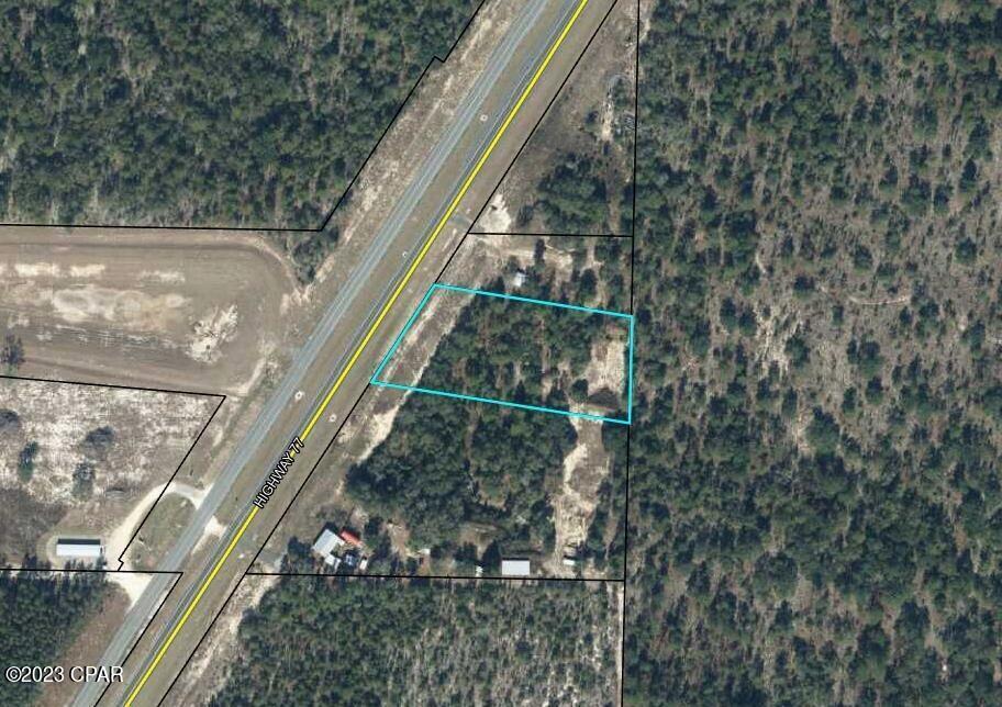 Recently zoned commercial this property is just North of the Dollar General Store. Plenty of opportunities for your business in a well traveled corridor. Approximately 220 feet of Highway 77 frontage. The highway is in the process of being widened to 4 lanes and is nearing completion.. Lots of new things going to be happening in the near future.