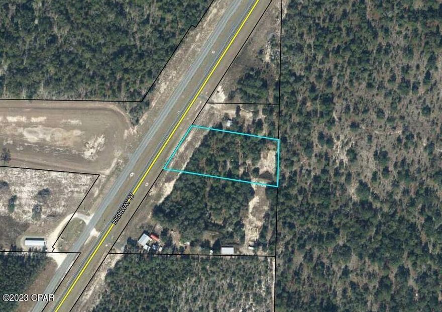 Recently zoned commercial this property is just North of the Dollar General Store. Plenty of opportunities for your business in a well traveled corridor. Approximately 220 feet of Highway 77 frontage. The highway is in the process of being widened to 4 lanes and is nearing completion.. Lots of new things going to be happening in the near future.