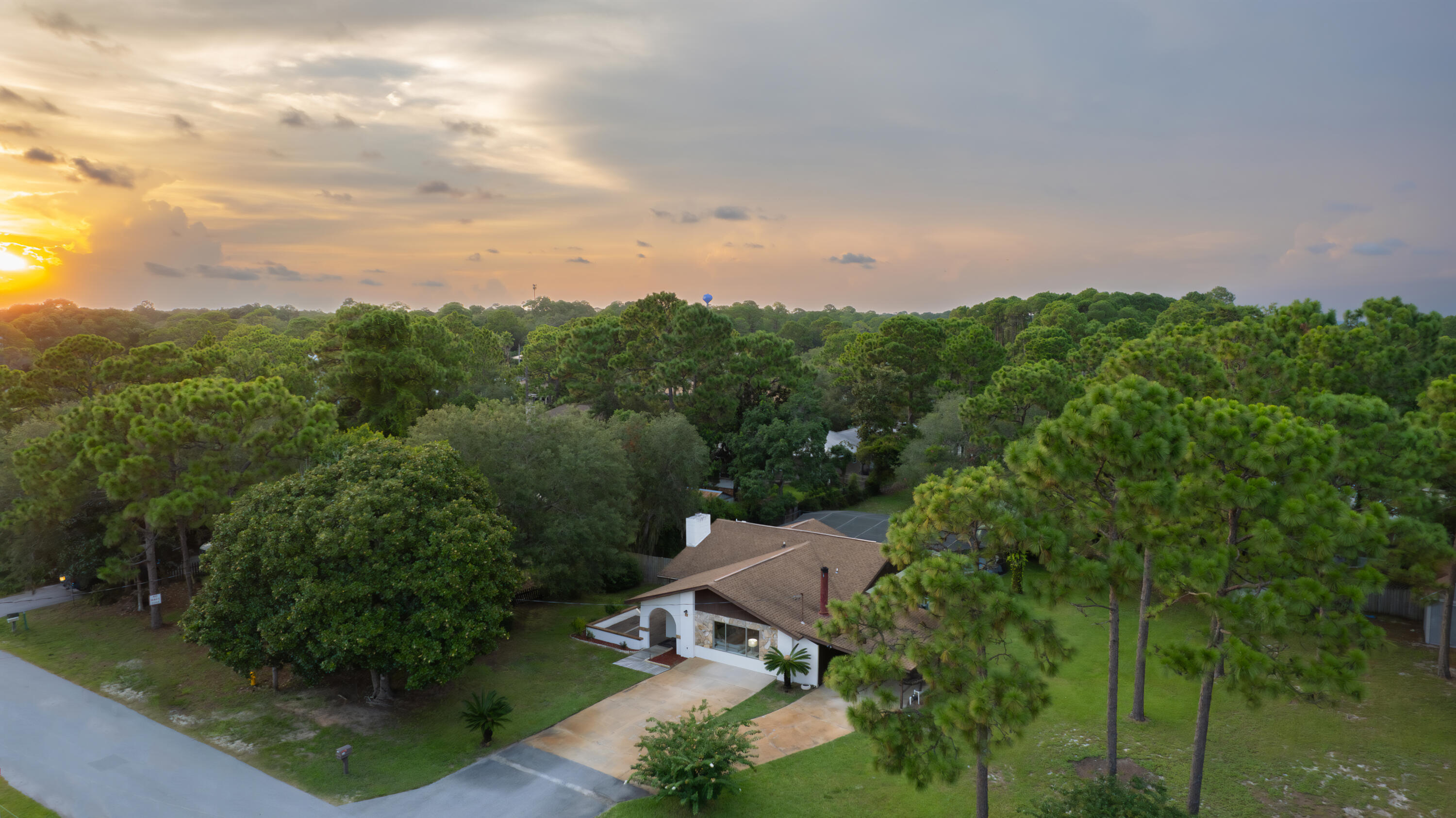 Investor's Dream! Welcome to this beautifully updated 3-bed, 2-bath home. It blends classic charm with modern updates, making it a perfect retreat or investment. Updates include fresh paint, LVT flooring, and a clean contemporary look with removal of the previous popcorn ceiling. New trim pieces, a shiplap wall in the master, and a sliding glass screen door enhance indoor-outdoor living. Outside, an in-ground pool with a screened deck, large attached carport, and two storage sheds. With a community boat launch, beach access, shopping, and dining nearby, plus no HOA, this property offers prime living. Sold AS-IS and unfurnished, with extra flooring and shiplap included. Don't miss this fantastic opportunity and schedule a showing today! Two expansion lots are available.