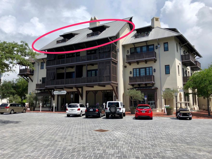 Recently reduced to $879,000 from $925,000. The asking price represents $729 per sq ft. Sold comps average $828 per sq ft. Centrally perched above Rosemary Beach's European-inspired Barrett Square, this two-bedroom, two-bath condo offers a stunning custom-designed interior complemented by one of 30A's most prized and picturesque vistas. Filling the 1,206 square-foot space with natural light and the opportunity to enjoy gentle beach breezes, the private double balconies allow for a gracious, open feel to the interior. Located on the top floor, overlooking Barrett Square of a secured and private residential 12-unit building, this gem of a condo features a welcoming entryway leading to an inviting, comfortable great room/dining area. The flow is perfect for enjoying intimate family gatherings or entertaining a group of friends. The gourmand's kitchen, with elegant marble counter tops and stylish cabinetry, offers a Viking gas range, refrigerator and dishwasher, as well as a large under-mount stainless sink and a professional-style faucet. Other upscale features include unique tilework, luxury bathroom finishes, hardwood floors, shiplap accents and a tasteful, custom built-in media center in the living area. This condo has private secured underground access, private elevator access, and private, secured underground storage. This is a green efficient building with brand new geothermal AC and heating. Steps beyond the four-story building's front door are several options for dining and shopping on the quaint town square. And just a short walk away, either the Western Green or Eastern Green can be found, where movies, concerts and other cultural events are hosted. Additional amenities include a fitness center, tennis courts, and swimming pools, including a private owner's only pool, as well as gated boardwalks leading to the sugar-white sands and emerald-green waters for which Rosemary Beach is internationally recognized.