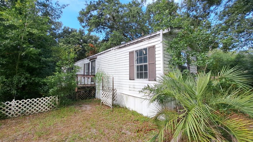 Fantastic find in close proximity to 9 Mile Rd shopping, university, hospital, and interstate 10! There are lots of possibilities with this home on nearly 3/4 of an acre fenced in lot!