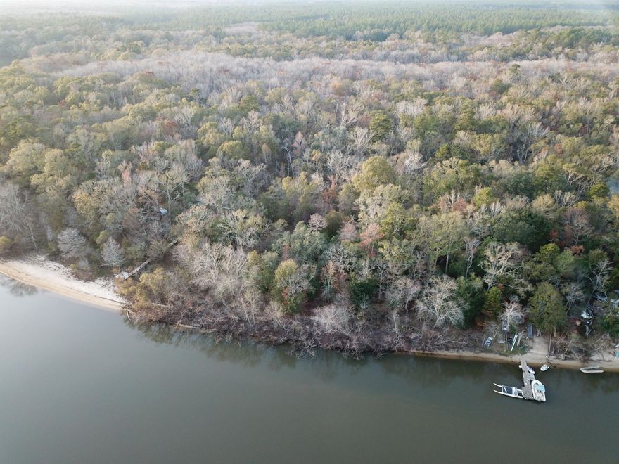Lovely treed lot with over 160 feet of riverfront. Not far from a public boat ramp and picnic area, this is an ideal location to set up your very own fishing camp or country retreat. This is a double lot and may be purchased as a whole or separately for $50,000.00 each. Cowford subdivision has covenants and restrictions but no HOA fees.