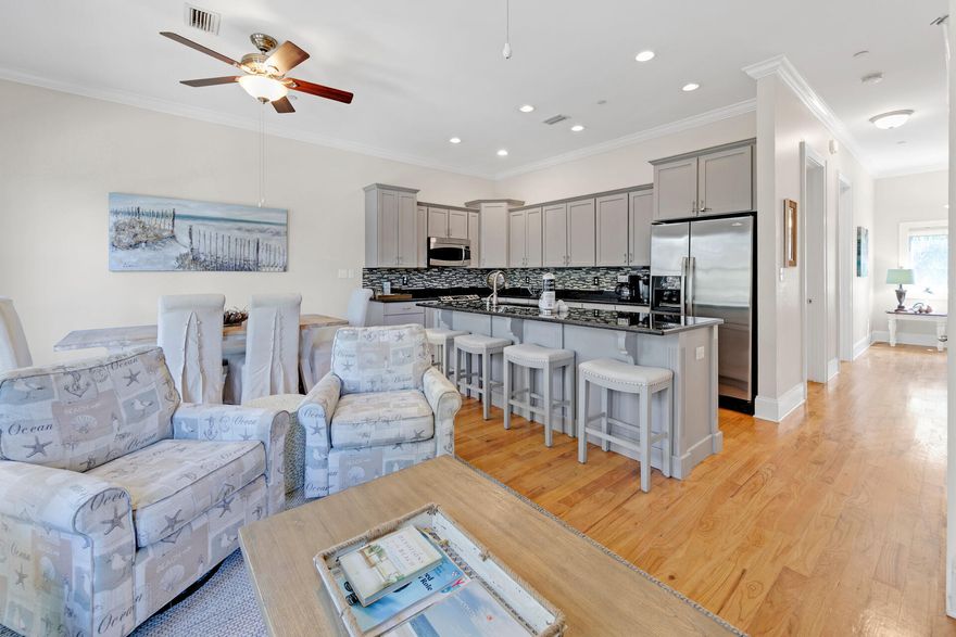 TURNKEY TOWNHOME! Conveniently located in a gated community one block north of 30A.  With 4 bedrooms and 4 full bathrooms and a 1 car garage, and large rooftop terrace, this large property is just what you have been waiting for! The private gated community has a pool and is surrounded by lush trees. Going to the beach?  Just head one block West and one block South and you're there!  Or, you can take the golf cart to your favorite 30A destinations (included in sale)!  The 1st floor offers a large bedroom with bathroom and access to the back grilling and picnic area. The 2nd floor boasts an open living, dining area and kitchen with recently updated cabinets, granite counter tops and stainless-steel appliances.  You will also find another bedroom and full bathroom.