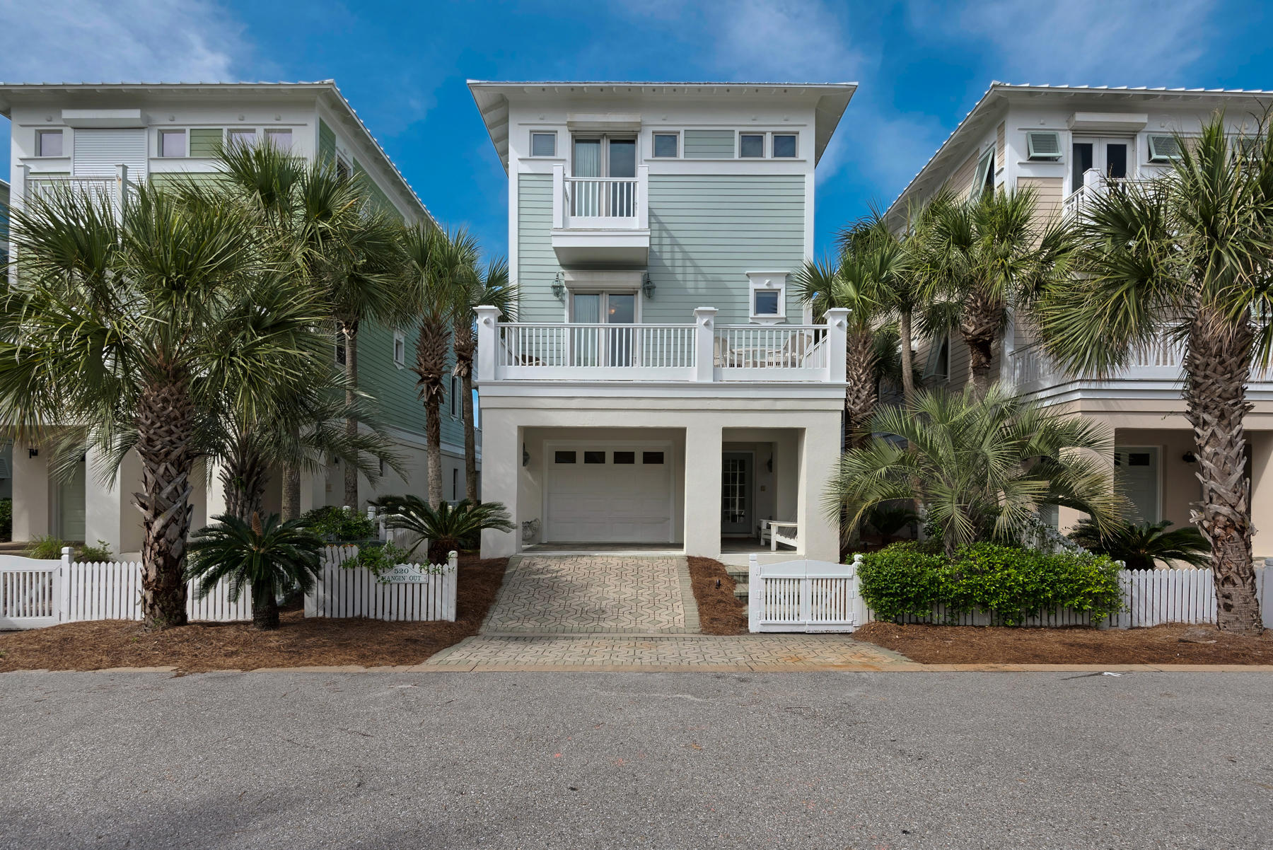This is a rare opportunity one of the enclave of Beachside Gardens beach cottages is now available for purchase. The Gulf Front property is a 5 bedroom, 4 bath home, which includes an additional ground level apartment consisting of bedroom, sitting area and bathroom. The house is decorated in a shabby chic style, very family oriented, and rental ready. The home has an interior elevator with access to all floors. The home grosses +/- $100,000 annually in rental income.