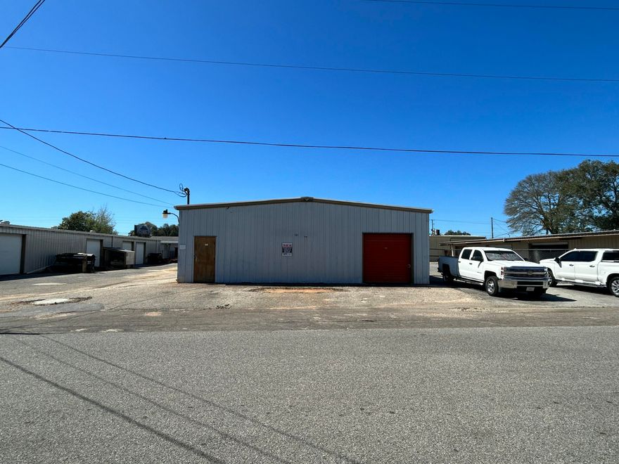 Truman Street Warehouse Park is a well-established warehouse property featuring a 5,200 square foot flex warehouse space with 636 sqft of heated and cooled office space and bathroom.
