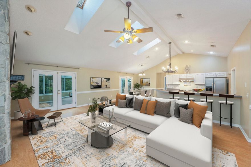 Welcome Home! If custom & comfort is what you seek then look no further!  This home has tons of natural light with an airy feel. The primary bedroom is a Kings suite & encompasses the entire left side of the home. The living room is expansive with a toasty fireplace for the fall and winter. The front guest room can be an office or an actual sleeping quarter as it has a closet.Kitchen is a chef's dream & comes equipped with a Thermador oven. Next up a beautiful glass solarium perfect for morning coffee, afternoon brunch, an evening glass of wine or your perfect plant collection.The back yard is enchanting, it has an above ground pool encased via a custom deck, there's also a hot tub off the 2nd guest bedroom. The home is perfect for a family, bachelor/roommates & entertaining