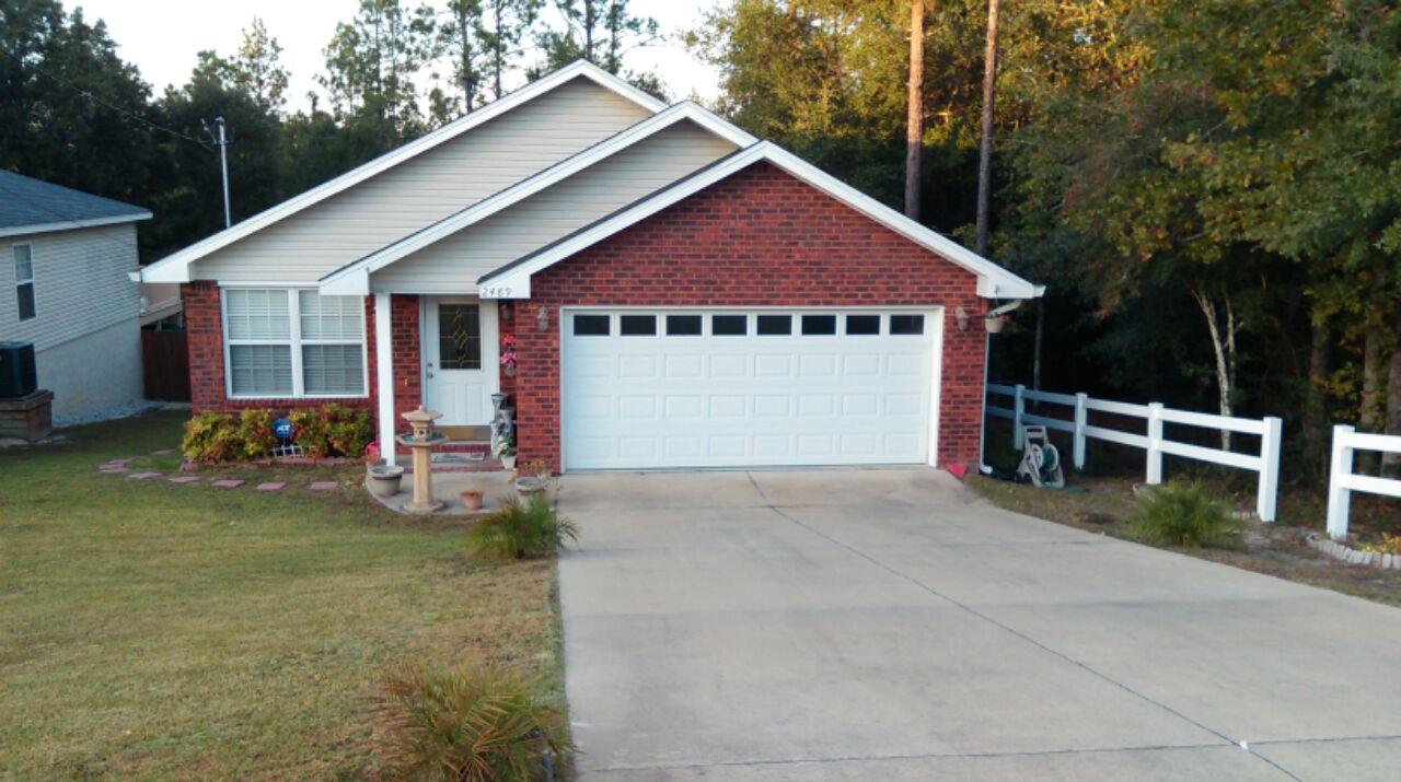 Available 04/01/2015....cute Florida cottage style home with a custom touch. Country living with privacy advantages. Easy commute to bases beaches and shopping. 3/2 Floor plan with custom paint throughout the home. Electric fireplace for cozy Florida winters and open concept floor plan. Over 1371 sqft. of living space, large kitchen, eat in breakfast area, large master, and beautiful wood floors in the main living area. Corner lot is adjacent to woods for the adventurer at heart. Large outdoor open back deck overlooks wooded privacy. Partially fenced back yard is pet friendly. No inside smoking. Pets may be allowed with a $400 non-refundable pet fee.