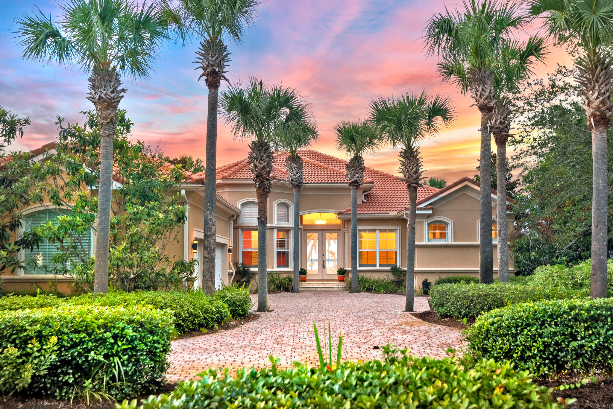 Discover what bay-front living exemplifies with 97 feet of water frontage! One owner, custom quality built bayfront home on the coveted, peaceful street of Emerald Bay Drive. This sophisticated, yet relaxing haven makes the most of its tranquil, waterfront setting, allowing the beauty of surrounding bay views to create a feeling of relaxation throughout. A striking semicircular driveway surrounded by lush landscaping provides for ample parking for guests and access to the oversized three car garage. Upon entering the home, the infinity pool and expansive breathtaking bay views are impressive. The spacious great room is perfect for indoor/outdoor entertaining. As it opens to a covered porch, cabana and outdoor BBQ area with gas grill and smoker. This quality built home is made from
